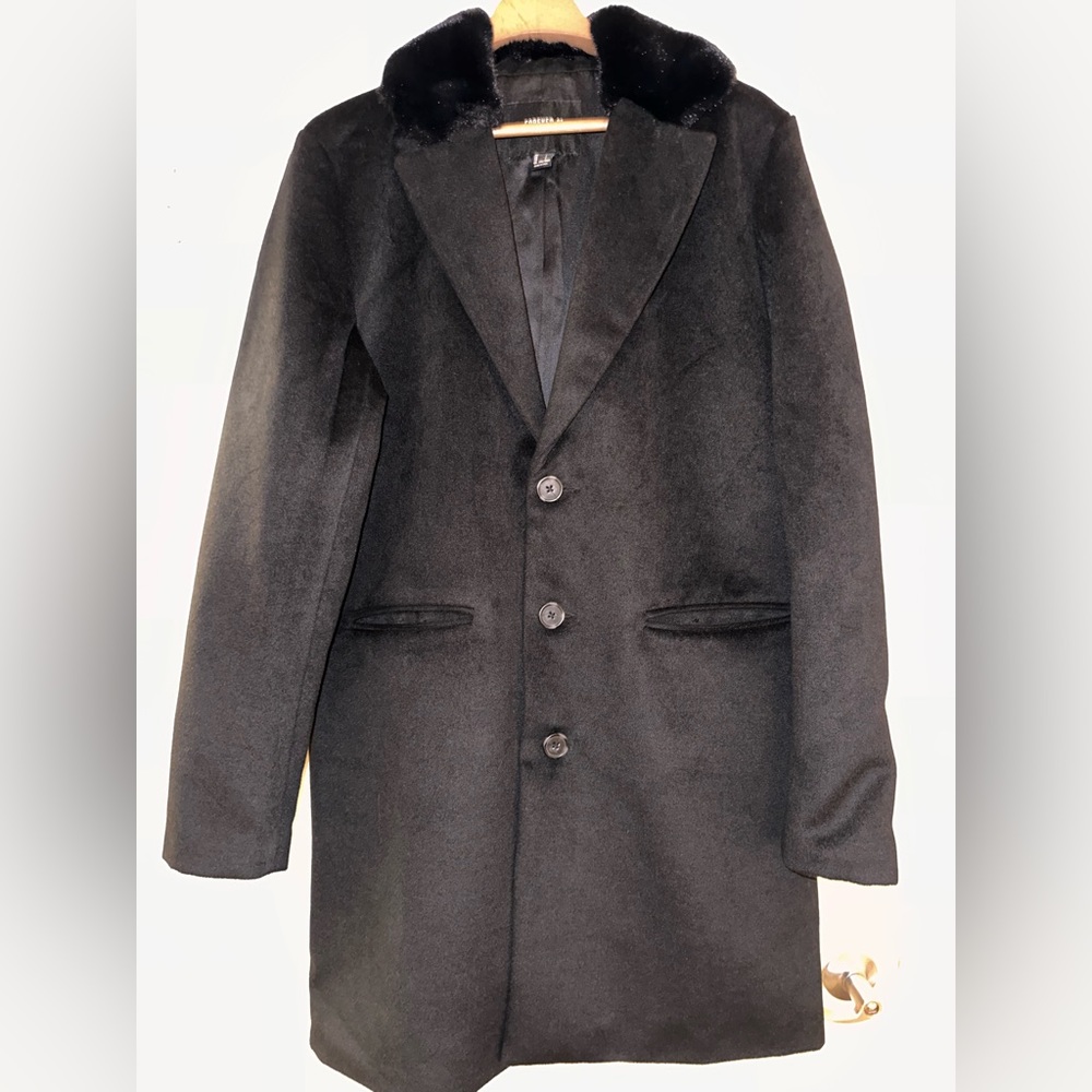 This jacket is from Forever 21.  Size L